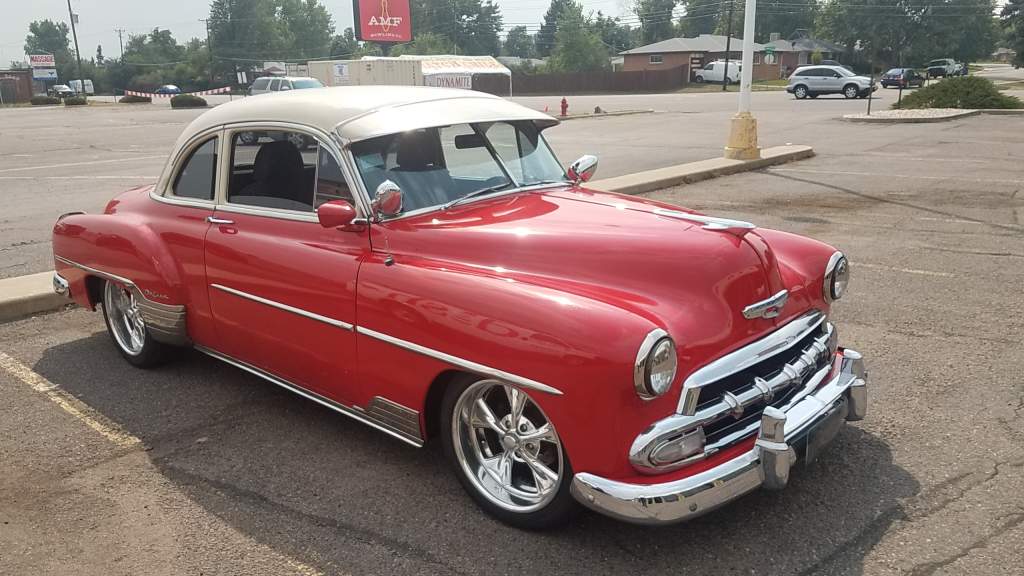 Beautiful red body, tan top, '54 Chevy Deluxe